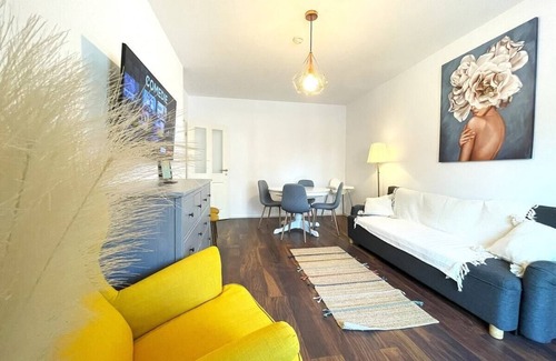 Tractorul Apartamento | Cozy Corner Apartment: Baby Crib and High Chair