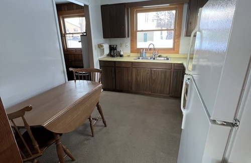 Houghton Lake Casa | Cozy Cottage, fresh laid sod, new concrete patio and sidewalk, sandy beach!