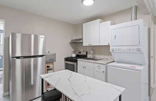 Northport Casa | Cozy Cottage- Tucked Away and Private. Close to Village and Shopping.