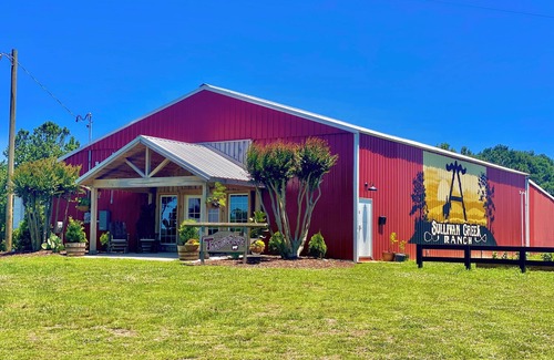 Vinemont Casa | Cozy cowboy retreat that feels like a western town overlooking a beautiful ranch