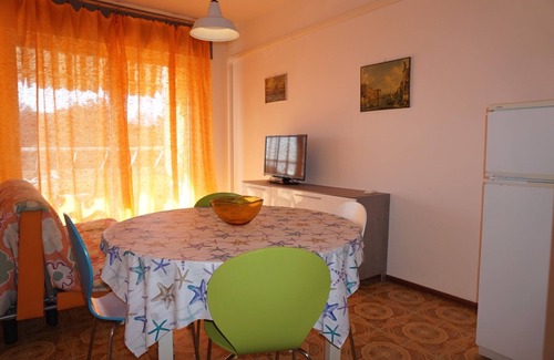 Porto Santa Margherita Apartamento | Acogedor piso con terraza, a 180m de la playa-Beahost
