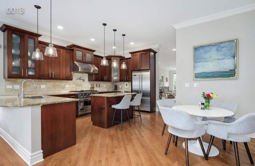 Palmer Square Casa | Cozy Home in the heart of Chicago W/Private Backyard & Games Room-Free parking.