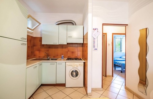 Lido delle Nazioni Villa | Acogedora villa de tres habitaciones con 6 camas, piscina y jardín compartidos.