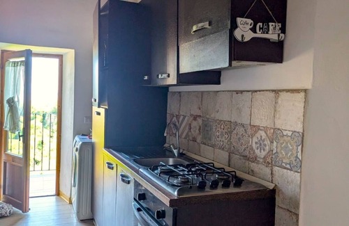 San Michele in Teverina Apartamento | Cozy house overlooking the badlands. Between nature, culture and relaxation.