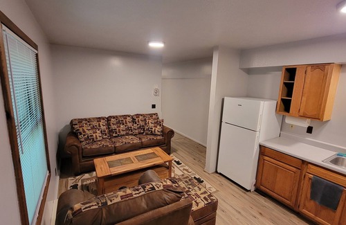 Bellaire Alquiler De RV | Cozy little cabin in a campground backed up to the peaceful woods.