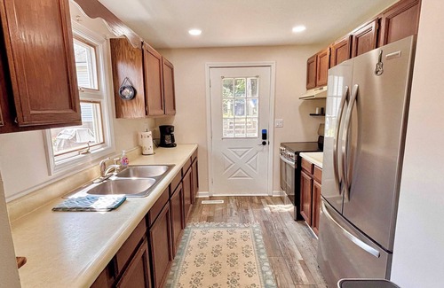 Rapid City Casa | Cozy Main Level Torch Lake Stay with Private Entry & Fire Pit