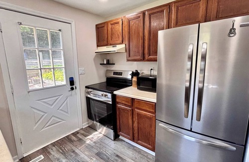 Rapid City Casa | Cozy Main Level Torch Lake Stay with Private Entry & Fire Pit
