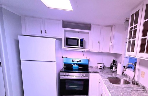 Groton Condominio | Cozy Ocean Breeze Retreat in a serene beach community in Groton, CT.