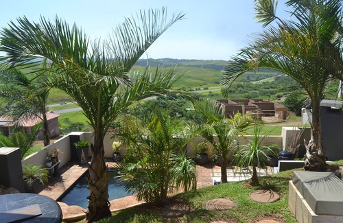 Kingsburgh Casa | Cozy one bedroom suite, with a balcony, overlooking the pool and braai area.
