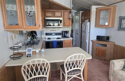 North Myrtle Beach Alquiler De RV | Cozy Park Model home in charming RV Park located in North Myrtle Beach