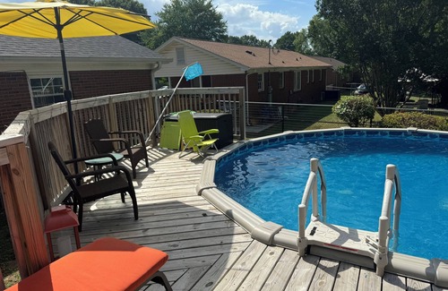 Oak Forest Casa | Cozy Ranch Style home with sun porch, above ground pool with fenced yard