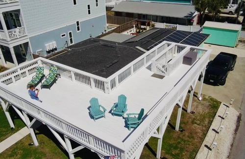 Bel Air Casa | Cozy Retreat , steps to the beach, heated pool , gulf views & huge party Deck