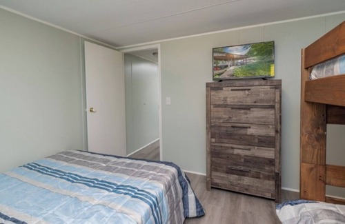 Wildwood Point Casa | Cozy retreat waterfront on beautiful Lake Gaston with community pool.