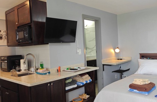 St. John's Apartamento | Cozy Studio with Seaview. Beach nearby/ On-site car rental/ Very comfortable bed