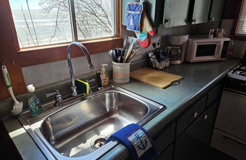 Oscoda Cabaña | Cozy Surfside Cottage on Great Lake Huron
