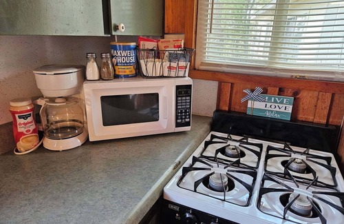 Oscoda Cabaña | Cozy Surfside Cottage on Great Lake Huron