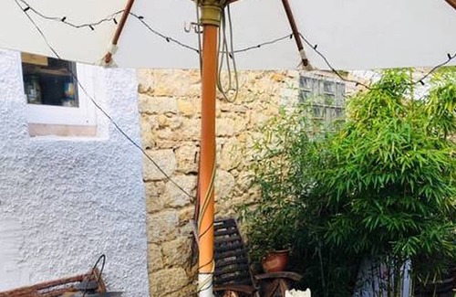 Gonsenheim Casa | Acogedora casa de pueblo con patio privado y jardín.