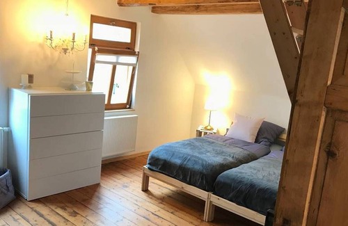 Gonsenheim Casa | Acogedora casa de pueblo con patio privado y jardín.