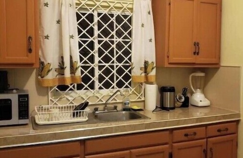 Mandeville Casa | Cozy upstairs apartment for two with great views. Book your stay today.
