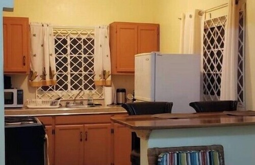 Mandeville Casa | Cozy upstairs apartment for two with great views. Book your stay today.