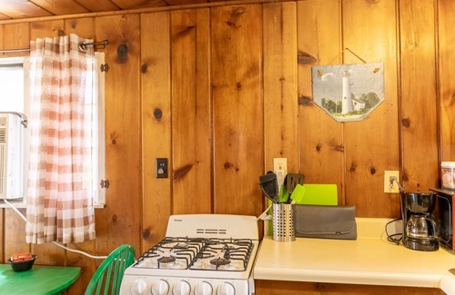 Au Sable Cabaña | Cozy cabin on Lake Huron! Firepit, grills, patio chairs and more!