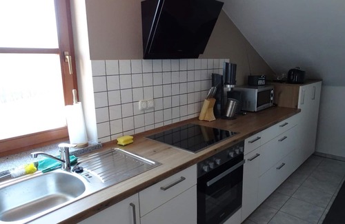 Grafenwiesen Apartamento | Cozy vacation apartment (75sqm) with wood-burning stove and balcony