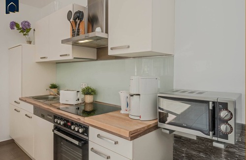 Korswandt Apartamento | Cómodo y acogedor apartamento en Wolgastsee con Wi-Fi y chimenea.