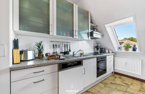 Stinteck Apartamento | Cozy vacation apartment on the North Sea with indoor swimming pool and balcony