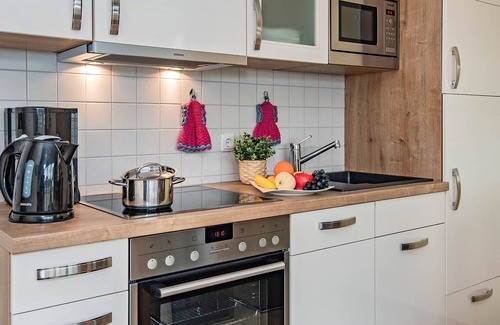 Korswandt Casa | Cozy vacation apartment Angela 1 - with fireplace & terrace
