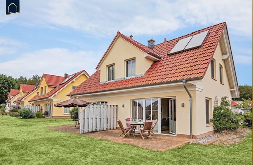 Korswandt Casa | Cozy vacation apartment Angela 1 - with fireplace & terrace