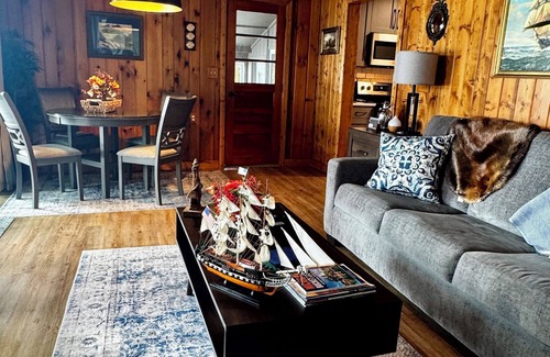 Newaygo Cabaña | Cozy Waterfront Cottage - 2 private docks, kayaks, pedal boat, grill & firepit!