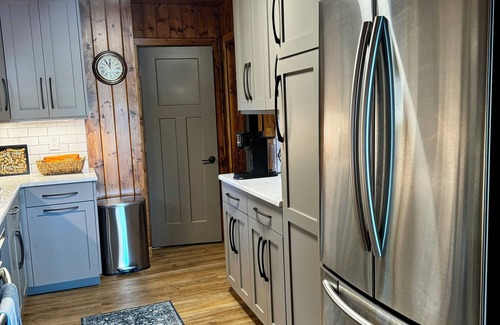 Newaygo Cabaña | Cozy Waterfront Cottage - 2 private docks, kayaks, pedal boat, grill & firepit!