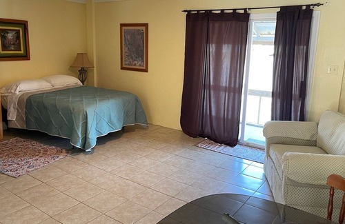 Pierre Part Apartamento | Cozy waterfront studio apartment with a covered deck on Bayou Pierre Part.