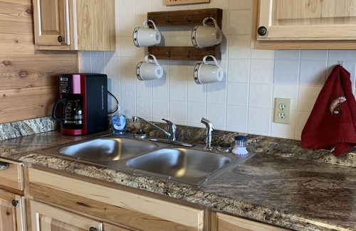 Norfork Cabaña | Cozy White River Cabin, perfect for a couple's getaway or fishing trip!