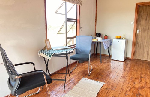 Palapye Cabina | Cozy wooden cabin overlooking the foot of the Tswapong Hills in Palapye.