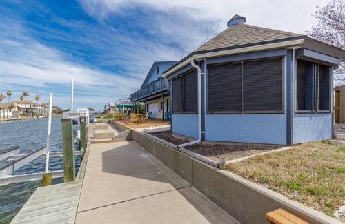City-by-the Sea Casa | Crazy about fishing? Check out this home on deep canal near Estes Flats, Redfish Bay, and the Intracoastal Waterway!