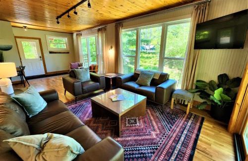 Traverse City Casa | Creekside Hot Tub-Walk to Beach-Uniquely Northern