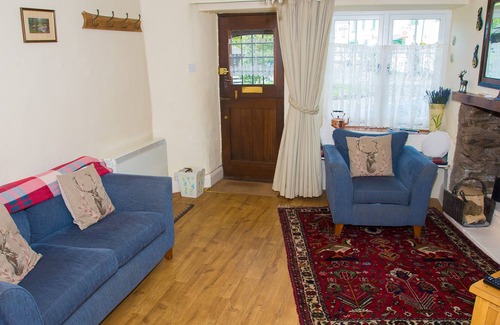 Exford Casa | Crown Cottage is a picture postcard thatched, self catering holiday cottage