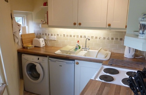 Exford Casa | Crown Cottage is a picture postcard thatched, self catering holiday cottage