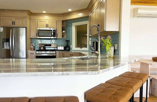 Lake Township Casa | Crystal Lake Hillside with Private Sandy Beach and Hot Tub!