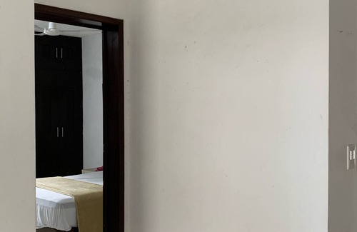 Colonia Campestre Apartamento | Cuarto con baño privado / Habitación con baño privado.