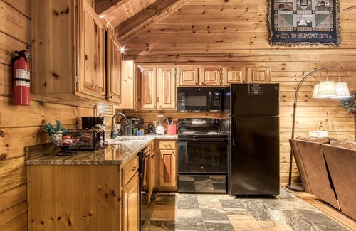Pigeon Forge Cabina | Cuddlin' Up, Er209 - Luxury At Its Finest And Location That Can't Be Beat! 2 Bedroom Cabin by RedAwning