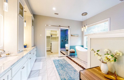 Waller Casa | Custom Home with Guesthouse, Pond, Swimming Deck, Beach & Tropical Bar