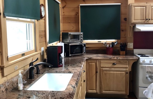Bath Casa | Custom Log Cabin on Wild Ammonoosuc River
