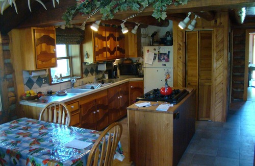 Mesa Casa | Custom log house located on the Grand Mesa one mile from Powderhorn Ski Resort.