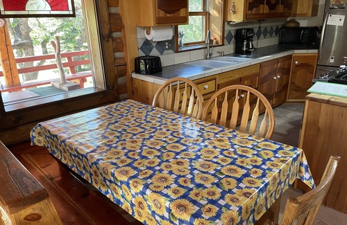Mesa Casa | Custom log house located on the Grand Mesa one mile from Powderhorn Ski Resort.