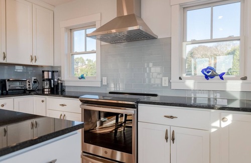 Green Hill Casa | Custom Waterfront Home on Green Hill Pond with kayaks, walk to beach