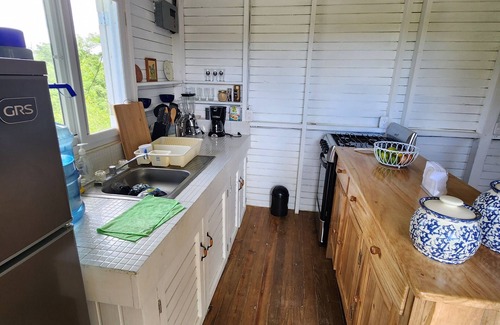 Rio Dulce Cabina | Cute & Cozy Caribbean Cabin on a farm.