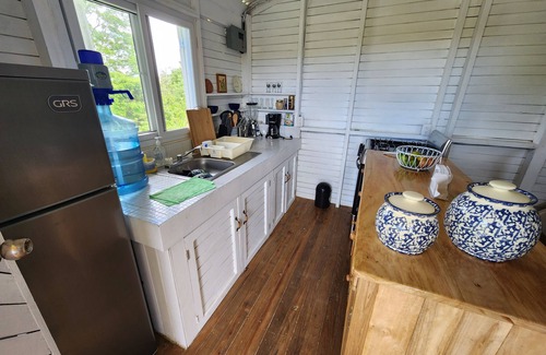 Rio Dulce Cabina | Cute & Cozy Caribbean Cabin on a farm.