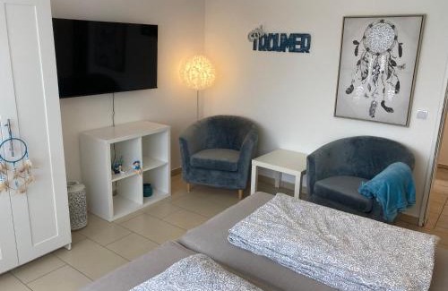 Holte-Spangen Apartamento | CUXTräumer - Stilvolle Ferienwohnung für Paare - WLAN, privater Parkplatz und Grill - Ruhige Lage mit Gartenblick, Nordseestrand und Wernerwald fußläufig, Cuxhaven- Sahlenburg